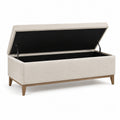 Cassapanca in tessuto beige con gambe in legno